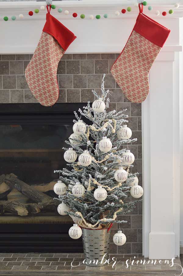 This Rae Dunn Inspired Christmas Ornament DIY will give your tree the perfect amount of simplicity while still being fun. And they will go with any Christmas decor whether it's farmhouse or modern.
