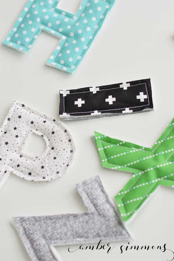 This fabric alphabet is so easy to cut with the Cricut Maker. It is the perfect gift for toddlers and baby showers.