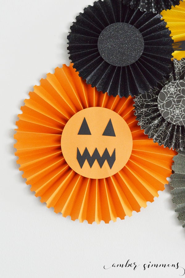 A simple tutorial for DIY Halloween rosettes with the Cricut Scoring Wheel. #CricutMade #Cricut #ad