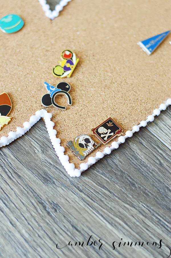 A DIY tutorial for a Disney Trading Pin cork board to keep all your Disney pins together in one magical place.
