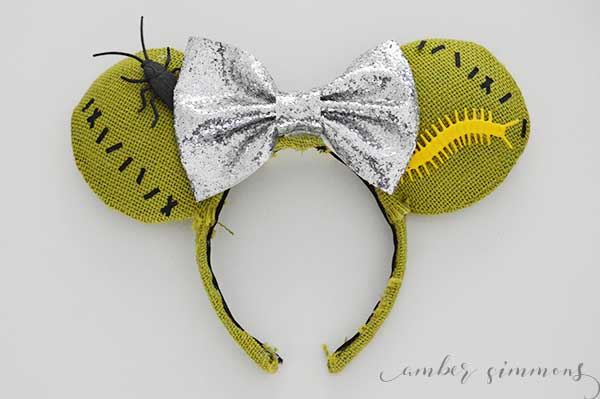 This tutorial for how to make these Nightmare Before Christmas inspired Oogie Boogie DIY Mouse Ears will have you dreaming of Halloween at Disneyland. #disney #handmade #cricutmaker
