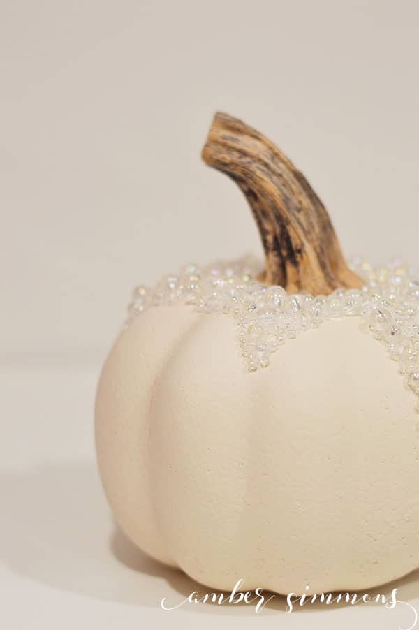 This simple DIY for how to create a stunning pumpkin dripping in pearls will class up your fall display in no time without a major dent to your wallet.
